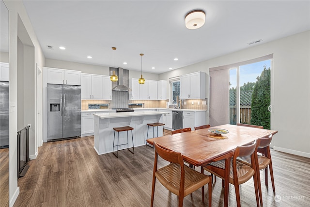 dining area with dark wood-type flooring