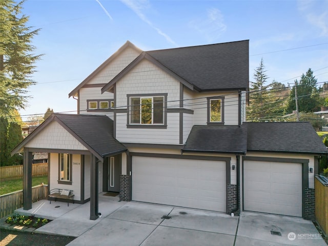 view of front of property with a garage