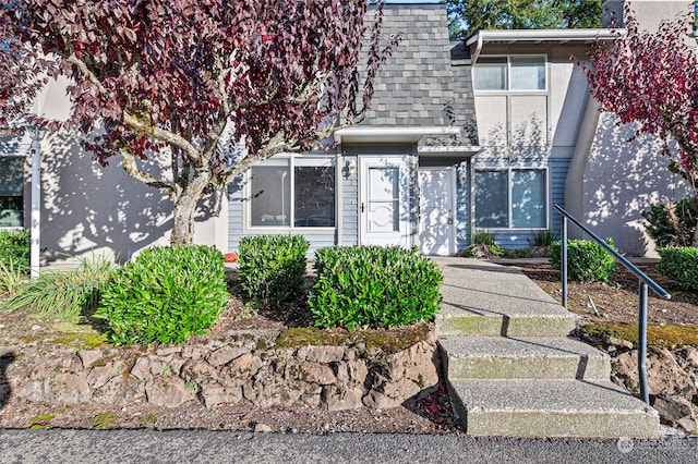 8309 Cirque Dr W Unit 7, University Place, WA 98467 - view of front of house with roof with shingles and mansard roof
