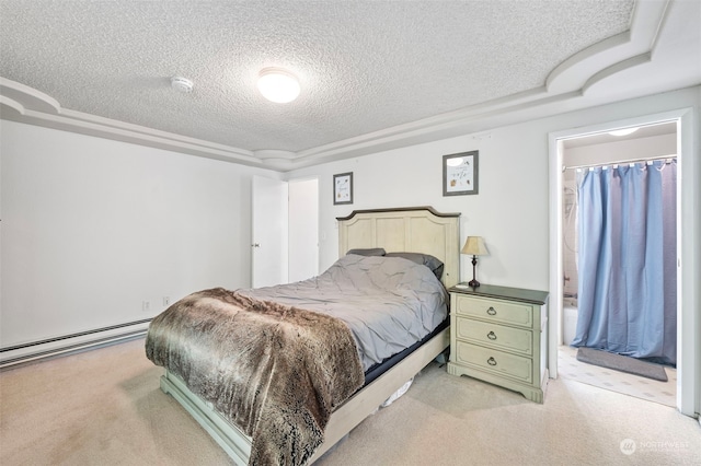 bedroom with light colored carpet, a textured ceiling, and a baseboard radiator