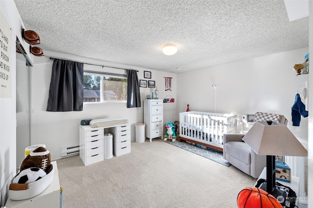 8309 Cirque Dr W Unit 7, University Place, WA 98467 - carpeted bedroom featuring a nursery area, a baseboard radiator, and a textured ceiling