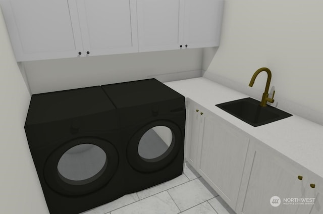 washroom featuring cabinets, sink, washer and dryer, and light tile patterned flooring