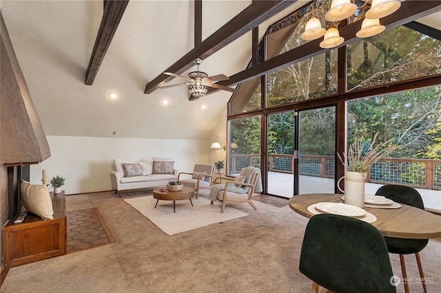 living room featuring high vaulted ceiling, light colored carpet, beam ceiling, and ceiling fan with notable chandelier