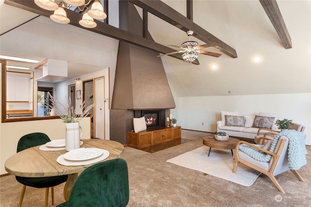 living room featuring a fireplace, ceiling fan, carpet flooring, and lofted ceiling with beams