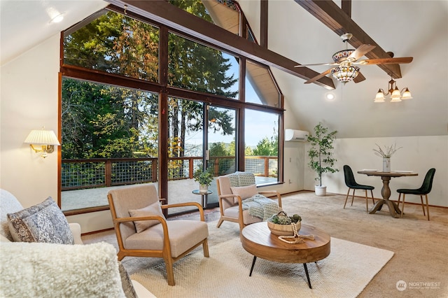 carpeted living room with high vaulted ceiling, a wall mounted air conditioner, and ceiling fan with notable chandelier