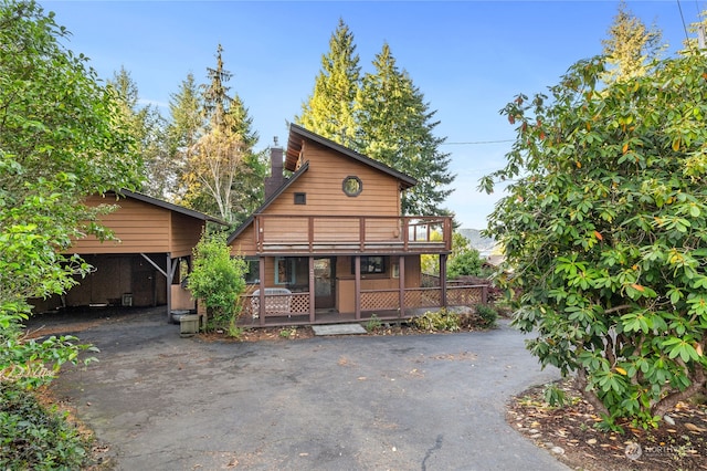 view of front of house featuring a deck