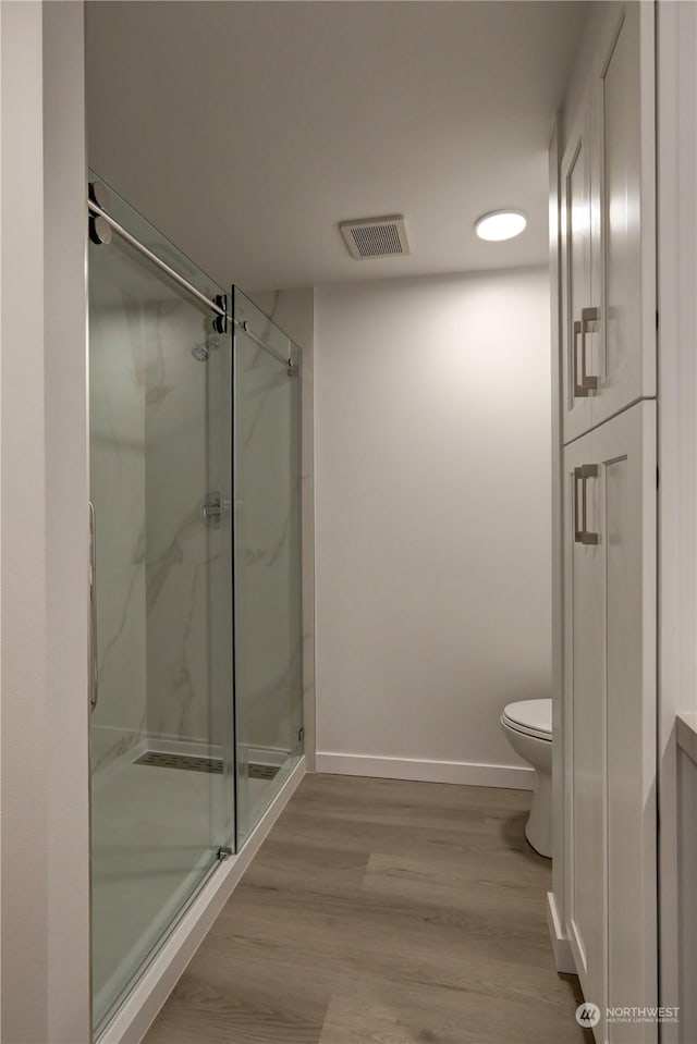 34716 169th Ave SE, Auburn, WA 98092 - full bathroom with a marble finish shower and wood finished floors