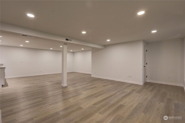 34716 169th Ave SE, Auburn, WA 98092 - finished basement featuring wood finished floors and recessed lighting