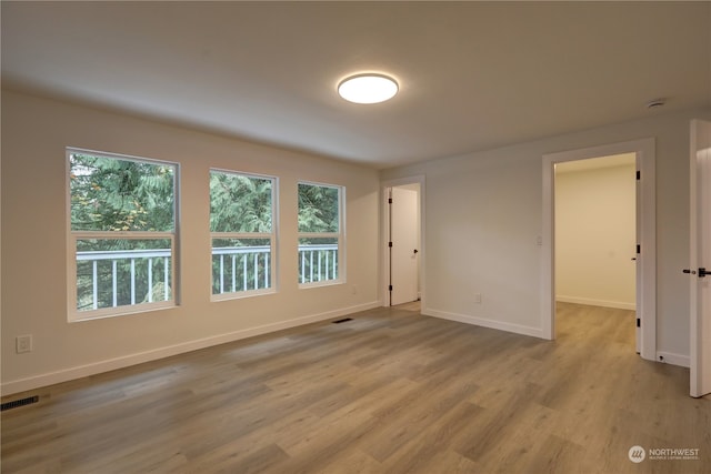 empty room featuring light hardwood / wood-style floors