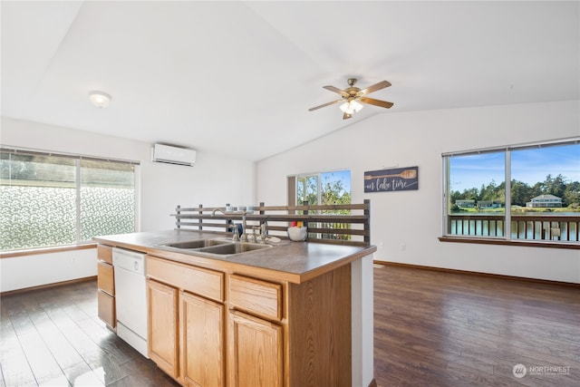 kitchen with a wall unit AC, white dishwasher, a wealth of natural light, and a sink