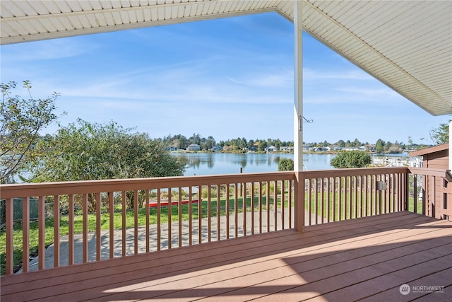 wooden terrace with a water view