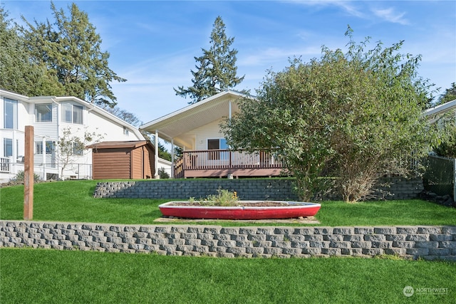 exterior space with an outdoor structure and a lawn