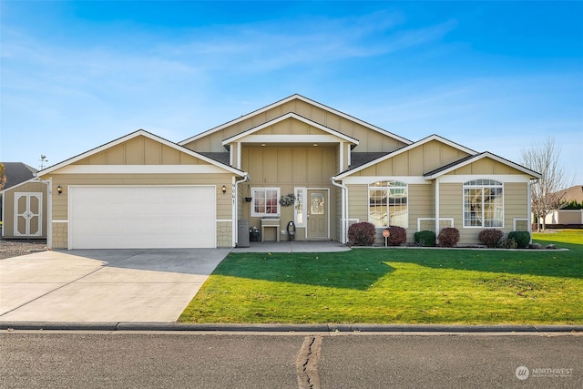 ranch-style house featuring a garage and a front yard