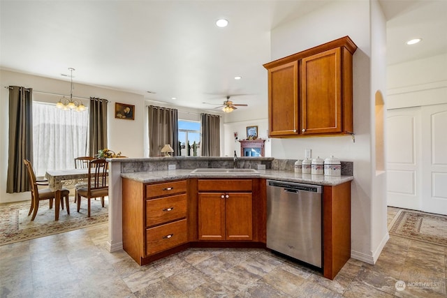 kitchen with dishwasher, ceiling fan with notable chandelier, a healthy amount of sunlight, and sink