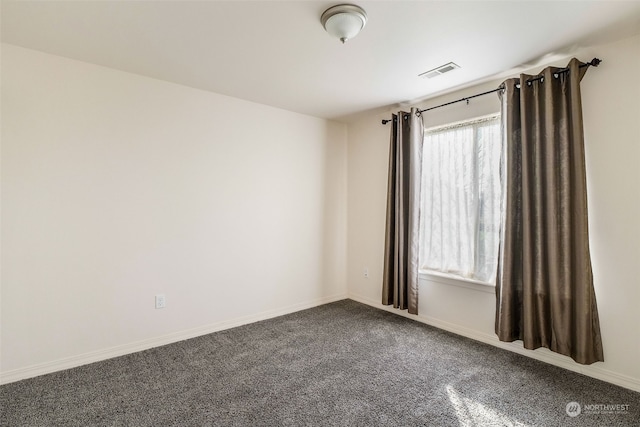 spare room with carpet flooring