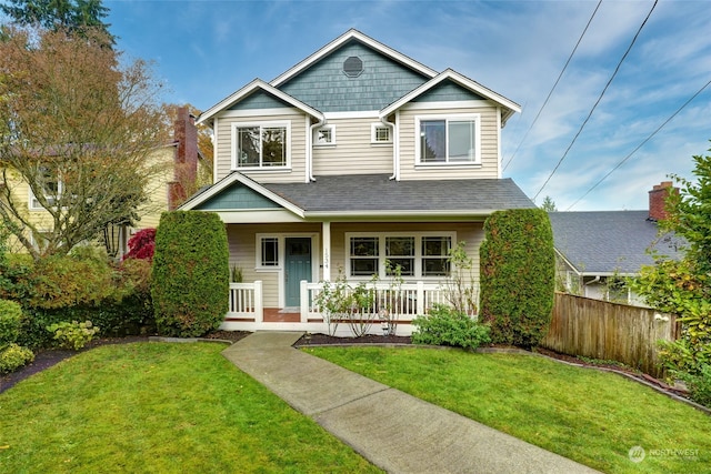 view of front facade with a porch and a front yard