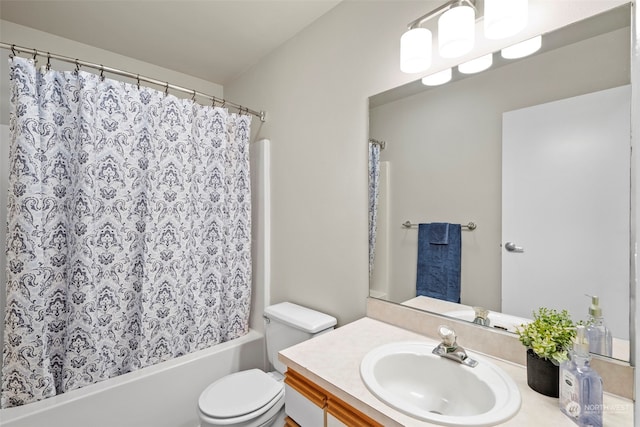 full bathroom with toilet, shower / bath combo, and vanity