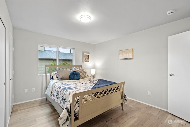 bedroom featuring light wood-type flooring