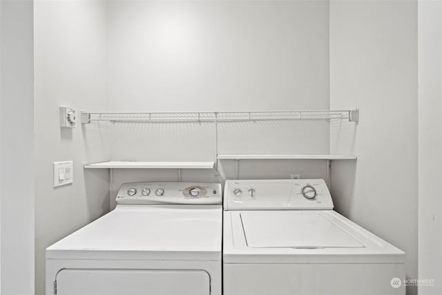 laundry room with independent washer and dryer