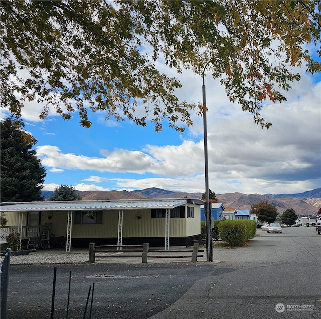 exterior space featuring a mountain view