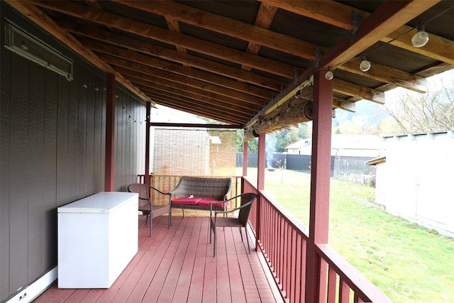 wooden deck with a yard