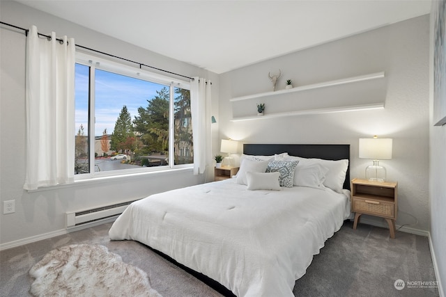 carpeted bedroom with baseboard heating