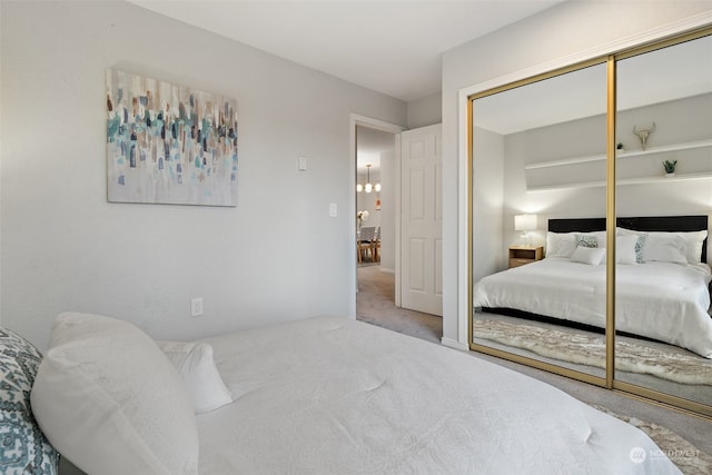 carpeted bedroom featuring a closet