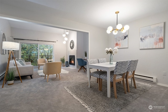 carpeted dining room with an inviting chandelier, baseboard heating, and a large fireplace