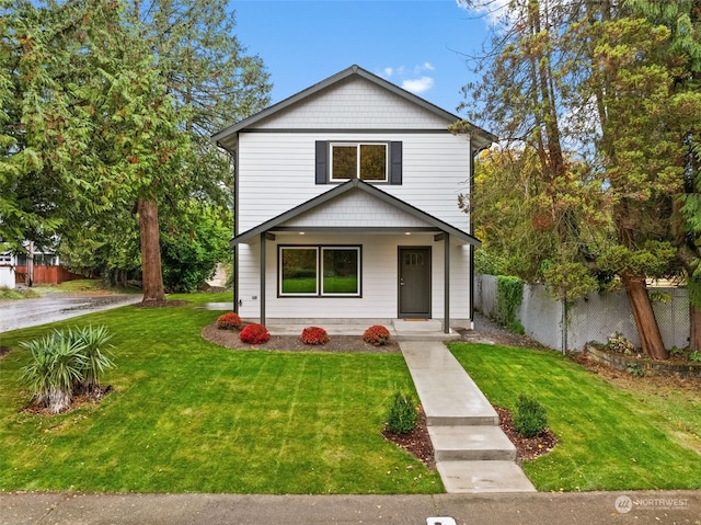 front of property featuring a front lawn