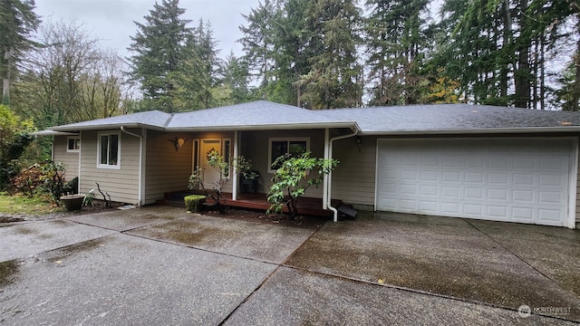 single story home with a garage