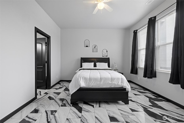 205 Clayton Pl, Mattawa, WA 99349 - bedroom with baseboards, a ceiling fan, and light marble finish floors