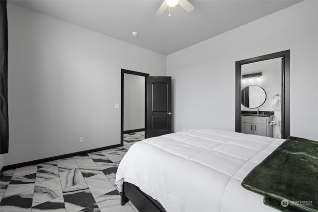 205 Clayton Pl, Mattawa, WA 99349 - bedroom featuring a ceiling fan, baseboards, and ensuite bathroom