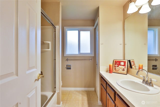 bathroom with vanity, tile patterned floors, and independent shower and bath