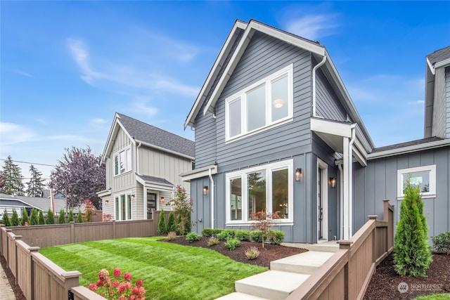 view of front of house with a front lawn