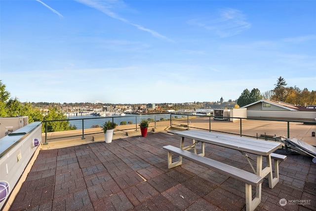 view of patio / terrace with a water view