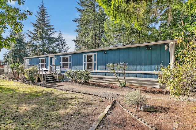 manufactured / mobile home featuring a wooden deck