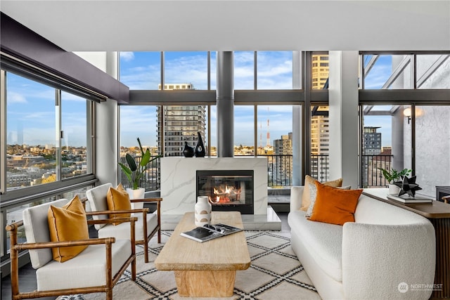 sunroom / solarium with a fireplace