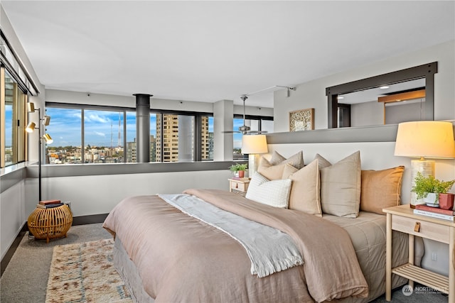 bedroom featuring light carpet