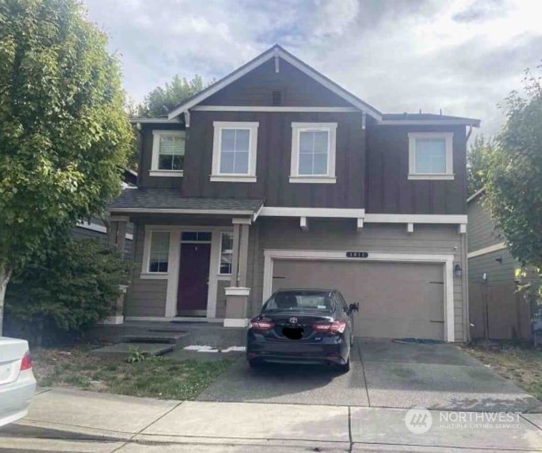 view of front of house with a garage