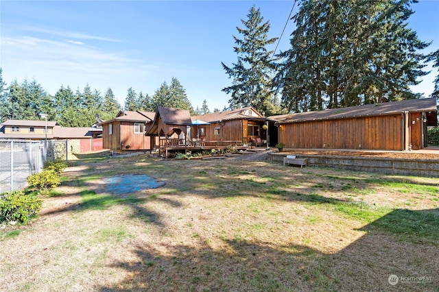 view of yard featuring a wooden deck