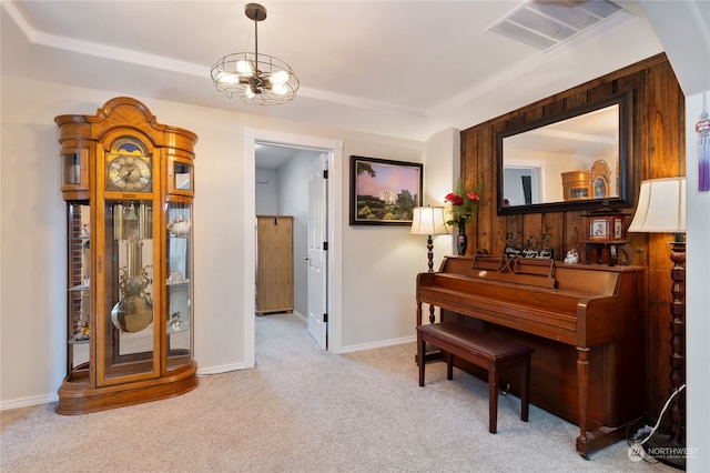 sitting room featuring baseboards, visible vents, a notable chandelier, and carpet flooring