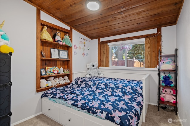 bedroom with vaulted ceiling, carpet flooring, wood ceiling, and baseboards