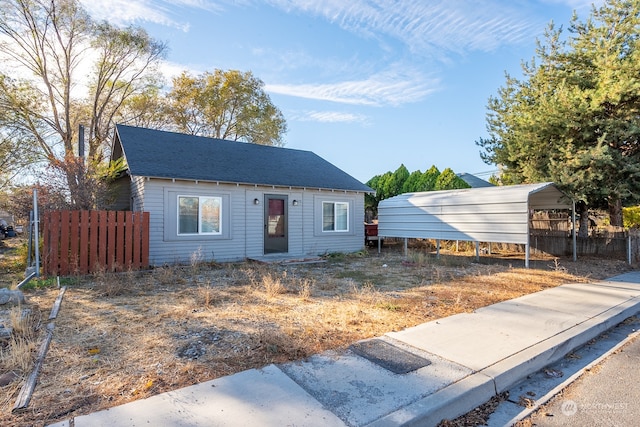 view of front of home with a carport