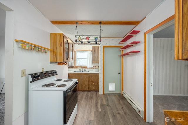 kitchen with sink, baseboard heating, dark hardwood / wood-style floors, pendant lighting, and white electric stove