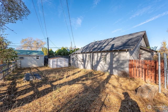 exterior space featuring a storage shed