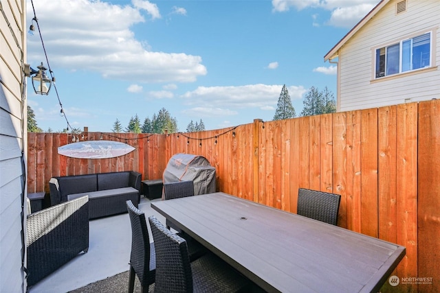 3821 NE 14th Pl, Renton, WA 98056 - view of patio / terrace with an outdoor living space, grilling area, and outdoor dining space