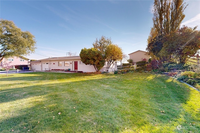 view of yard with a garage