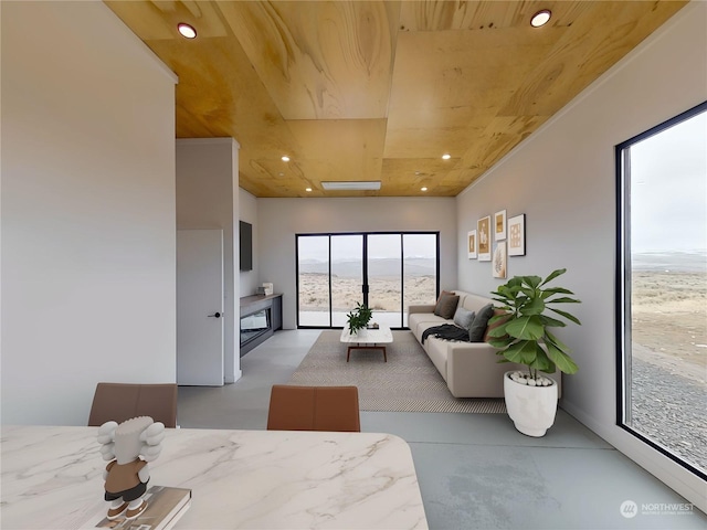 living room with wood ceiling and a fireplace