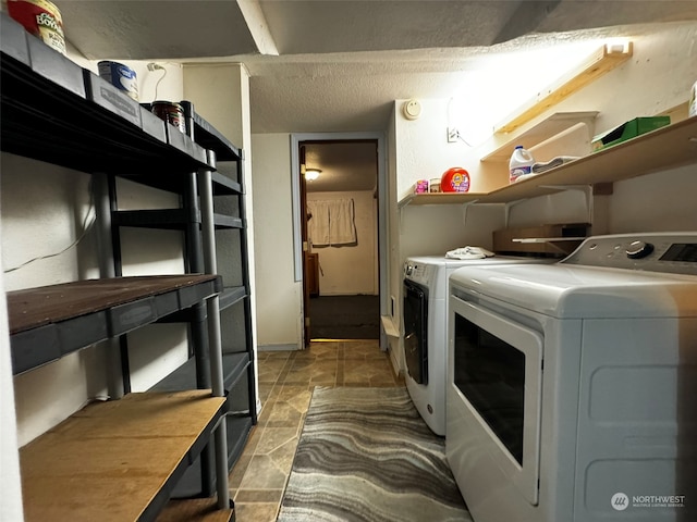 washroom with light tile patterned floors and independent washer and dryer