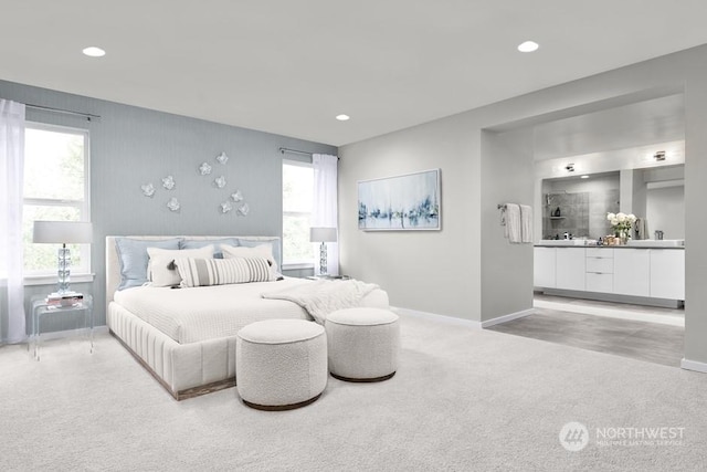 24218 118th Pl SE, Kent, WA 98030 - bedroom with baseboards, recessed lighting, ensuite bathroom, multiple windows, and light colored carpet